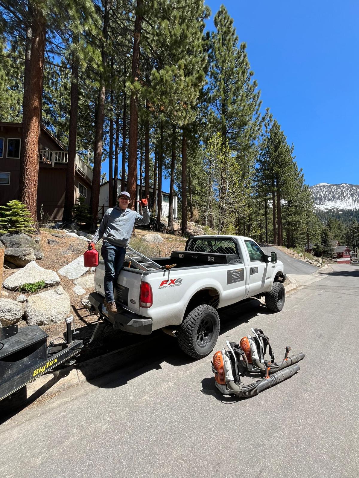 Stamparini Services crew ready with backpack blowers and truck for defensible space work